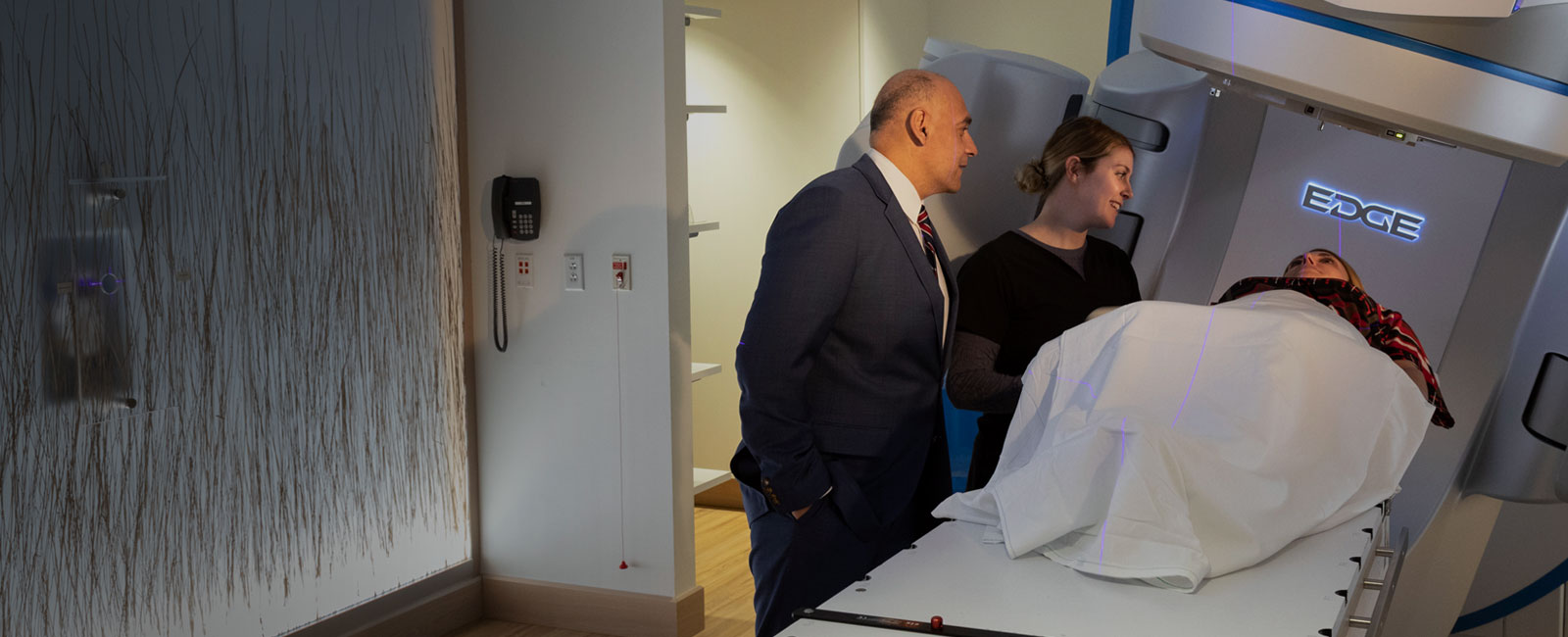 Decorative Photo of a Doctor and a Nurse with a Patient